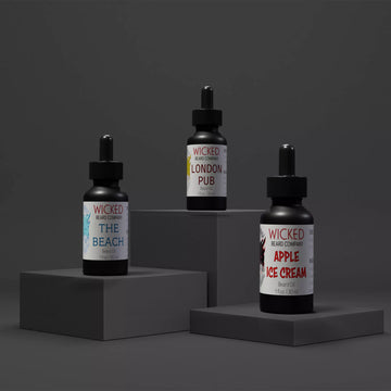 Image of 3 beard oils on black petistals and black background from Wicked Beard Company