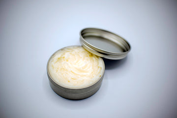 Open 2oz container of Wicked Beard Company beard butter.