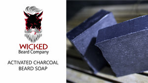A commercial add of a man in the shower washing his beard for Wicked Beard Companies Activated Charcoal Beard Soap.